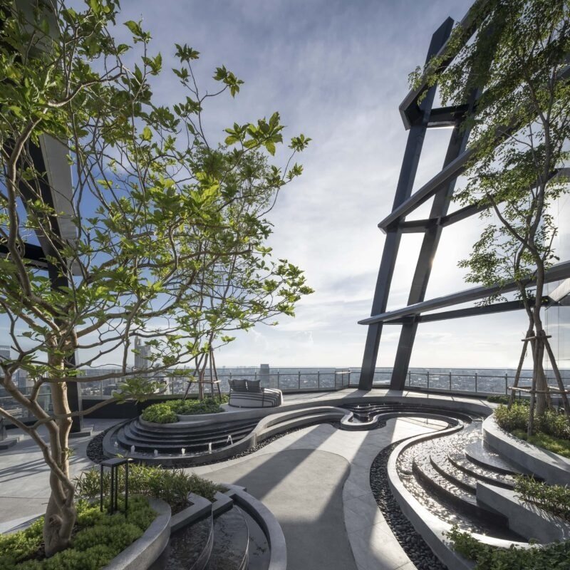Rooftop garden with sculpted seating and the tower structure